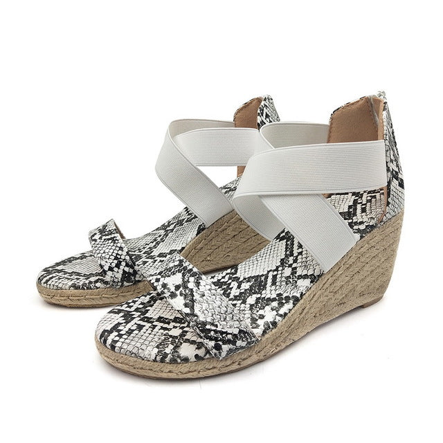 The Ove Leopard Wedge Sandals