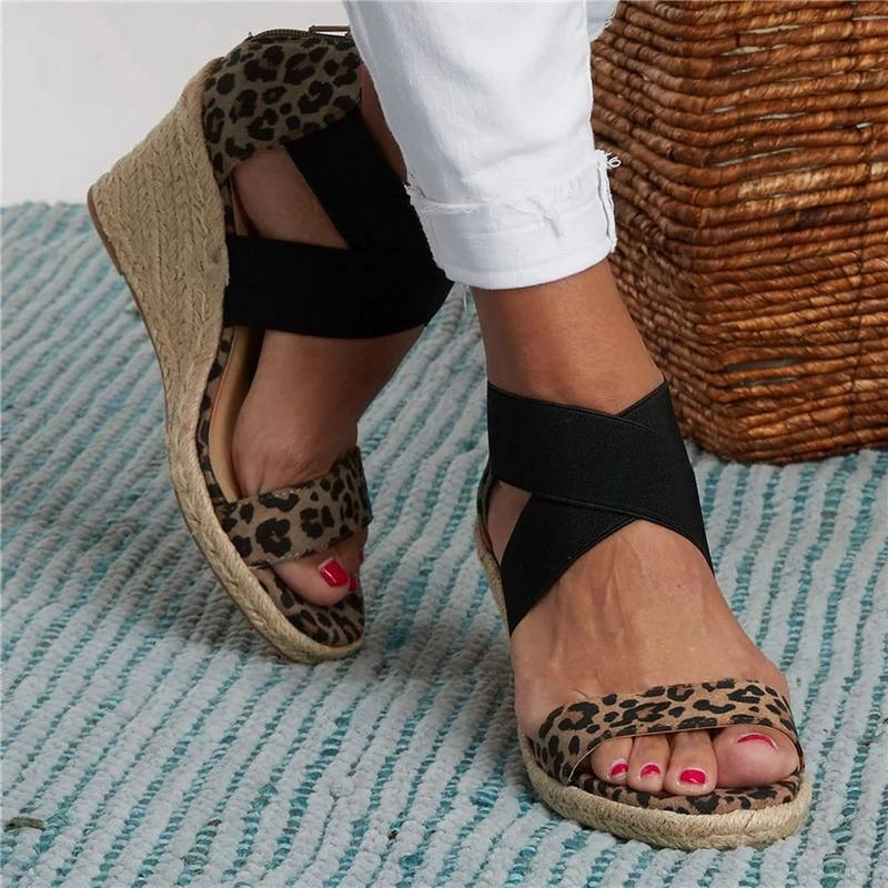 The Ove Leopard Wedge Sandals