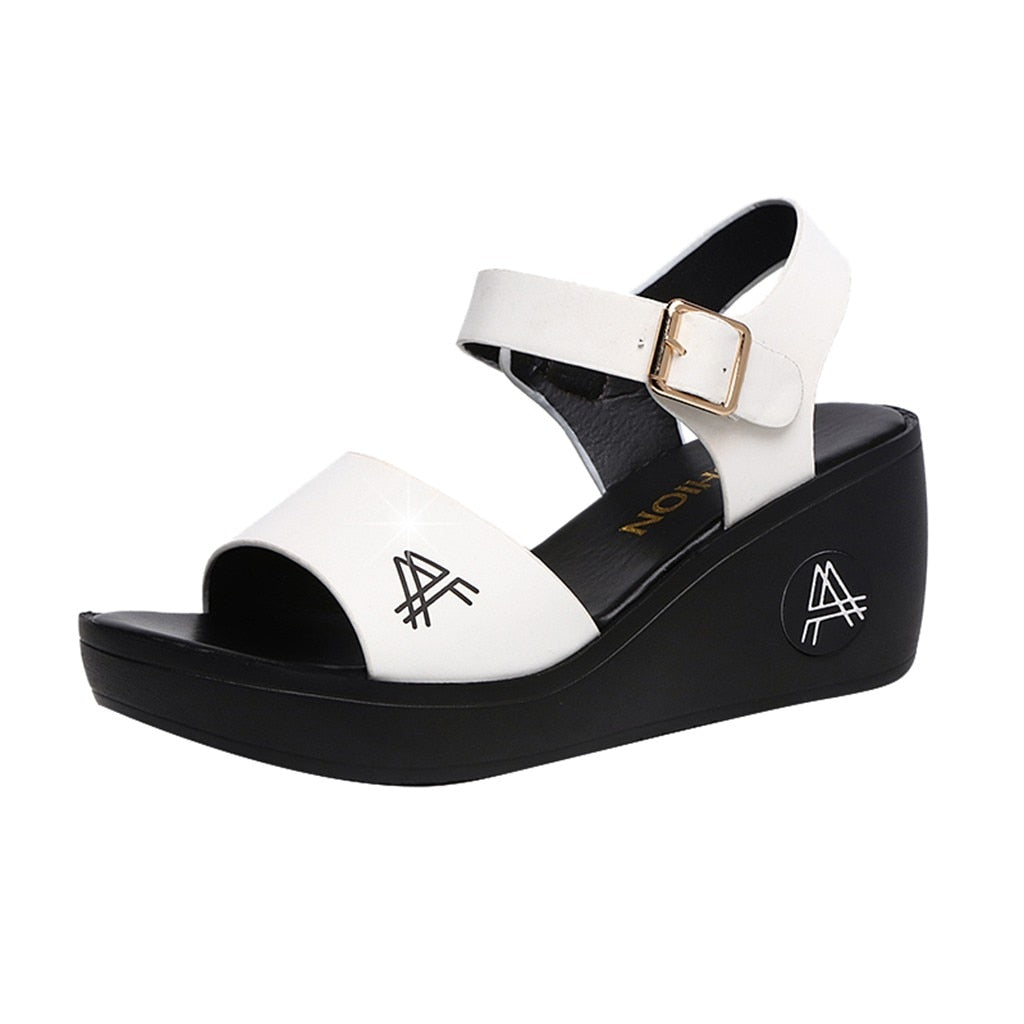 The Elda Roman Wedge sandals